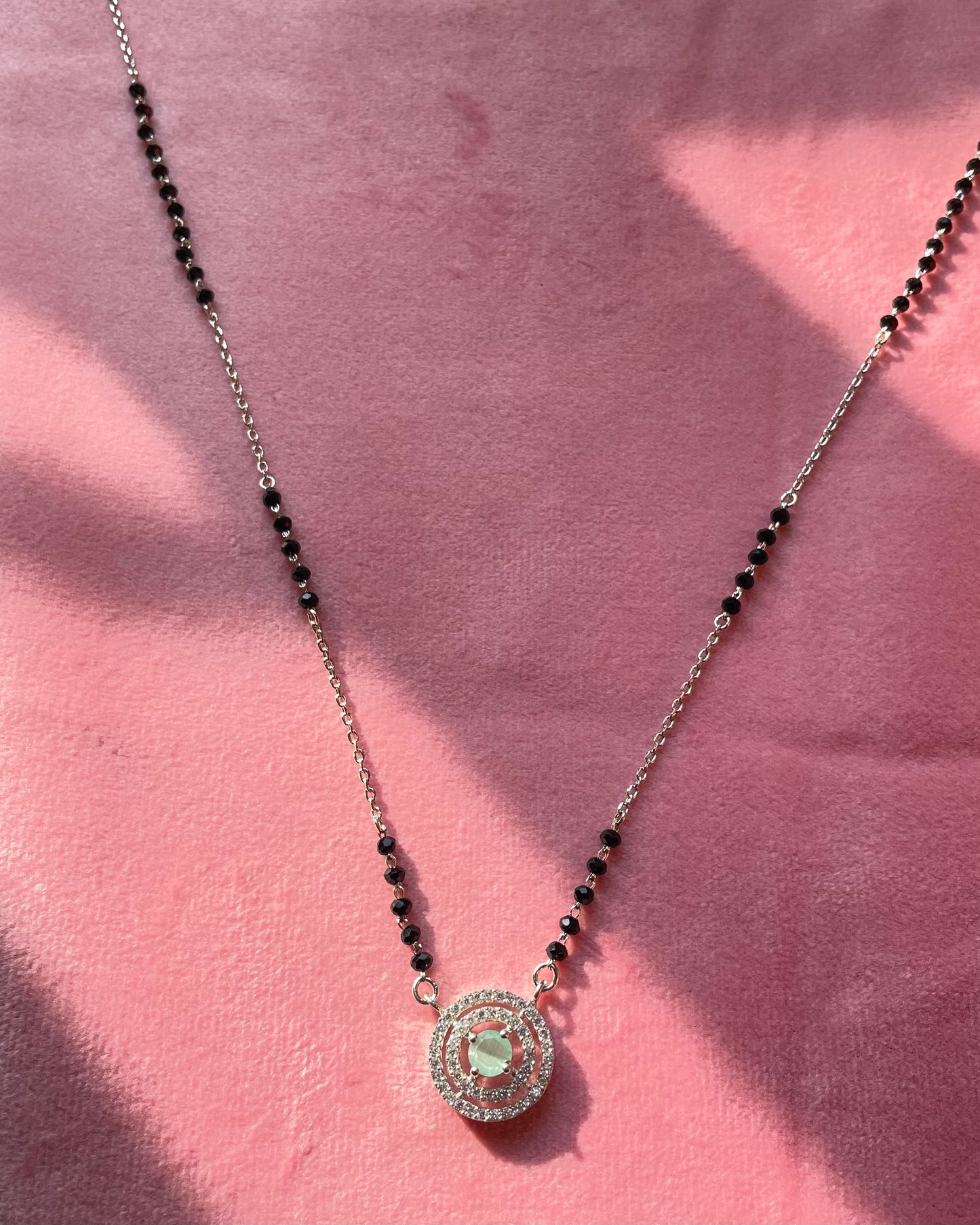 The Emerald Glimmer: 925 Sterling Silver Mangalsutra with Double-Ring Halo
